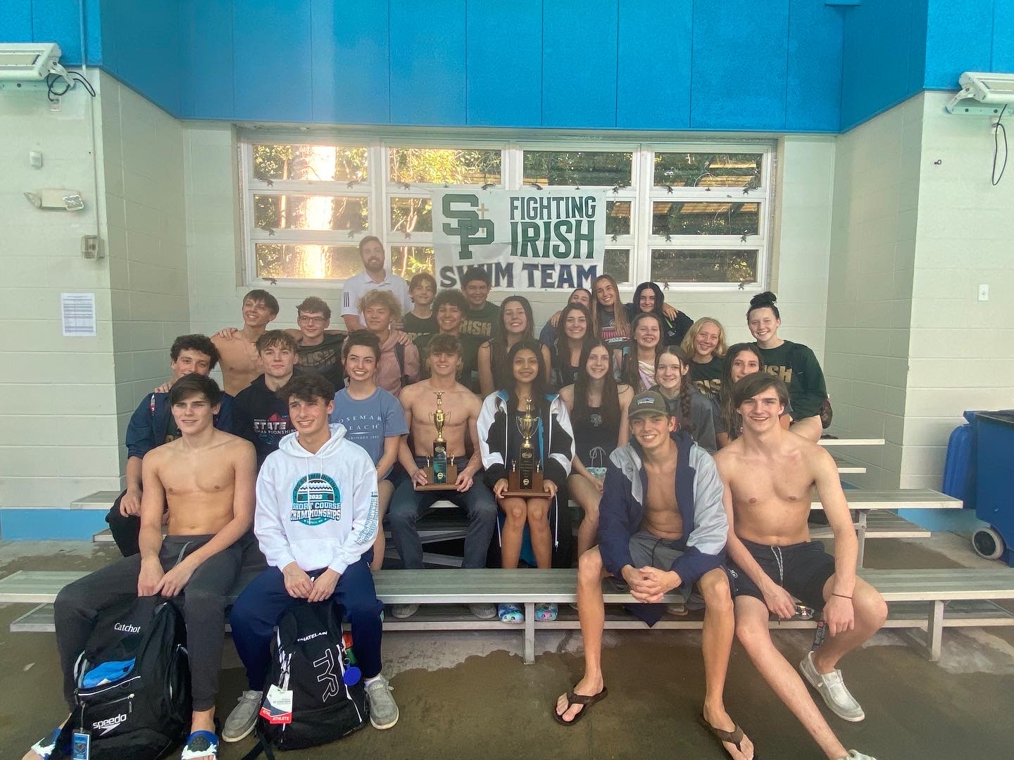 group picture of the swim team at the south state meet